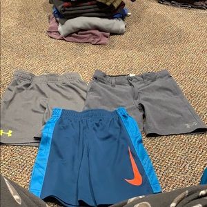 Boys Used Nike and UA shorts size 6